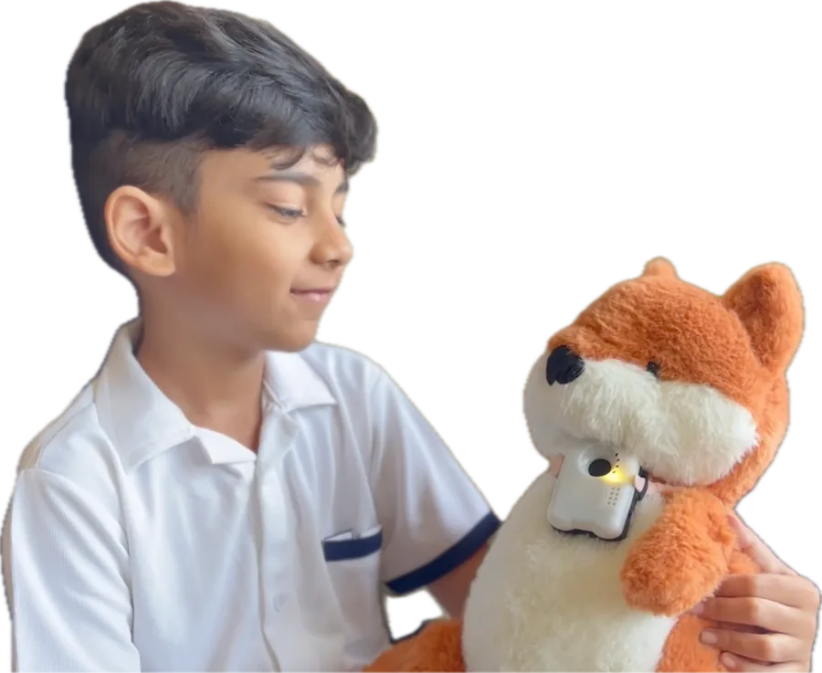 A boy smiling at a fox plushie wearing Elato